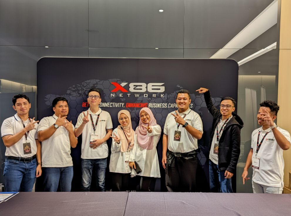 The X86 Network team at an industry event
